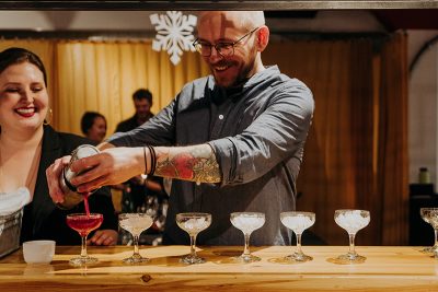 Who wouldn't crack a smile like this at the sight of a freshly poured cocktail?