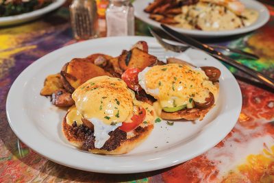 Roots Café serves a delicious helping of Eggs Benedict.