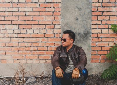 Jun Song wearing the Brad Jacket by Belstaff with Wolverine and Filson collaboration boots called the Rowan.