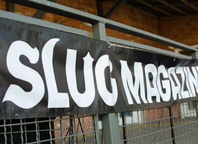 Slug Magazine's banner donned the stage at the first SLUG Picnic.