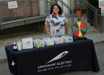 Roz Sylvia with Sparrow Electric exhibiting at the SLUG Picnic.
