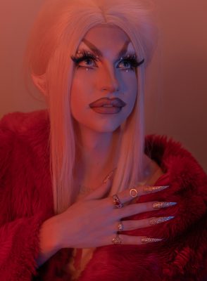 Lady Façade fondly recalls, “The fact that my drag brought so many people from different aspects of my life into one room still blows my mind.” 