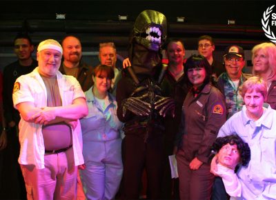 Alien on Stage: The Documentary combines into one gloriously goofy and strangely inspiring film, and it truly must be seen to be believed.