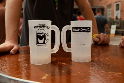 The distinctive clear plastic mugs housed the many pours at the Brewstillery festival.