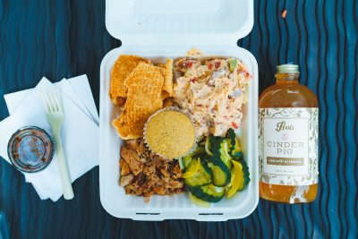 Cinder Pig’s Pork Plate has all the fixings for a filling meal. Paired with their Han’s Kombucha collaboration, this meal really hits the spot!