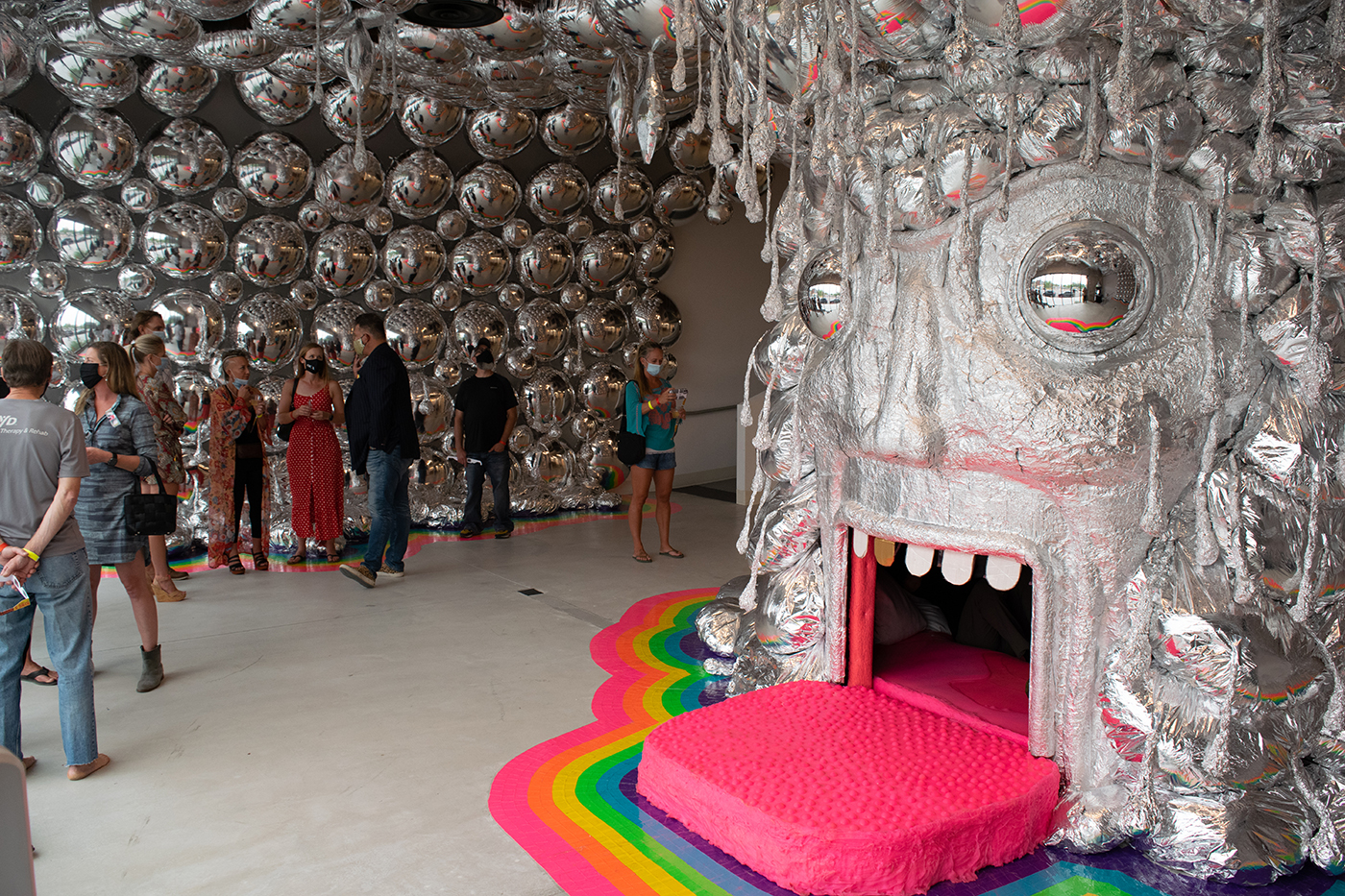 The King’s Mouth is a hands-on exhibit in which participants climb into the art piece itself to explore a sensory light show.