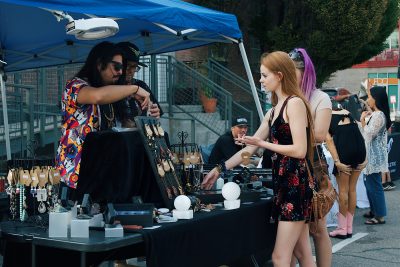 ??? selling some of their wares to SLUG Picnic crowd-goers.