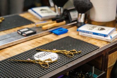 The tenets of self-care and relaxation are a hallmark of many a barbershop, but Retro-Barbers extends the ethos with their all-encompassing aesthetic.