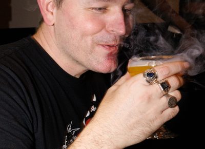 John Ford, SLUG Community Development Manager, enjoying a smokin' Boogie Nights cocktail.