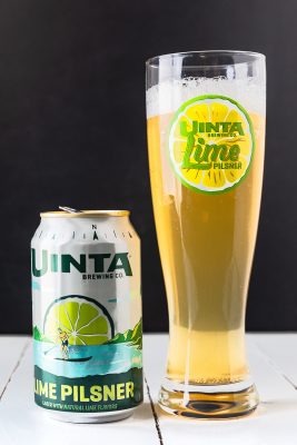 A pilsner glass is a tall, narrow glass which typically holds 12–20 ounces and is used to make a beer shine.