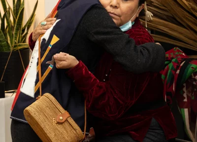 Denae Shanidiin and Yolanda Francisco-Nez hug.