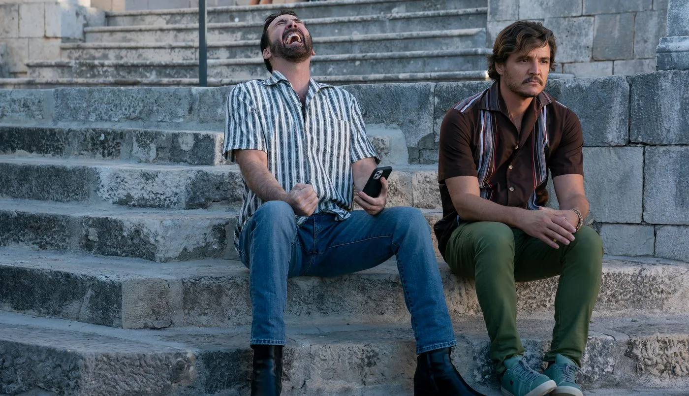 Still of Nicolas Cage and Pedro Pascal in The Unbearable Weight of Massive Talent