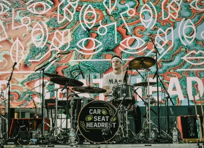 Car Seat Headrest drummer playing live music