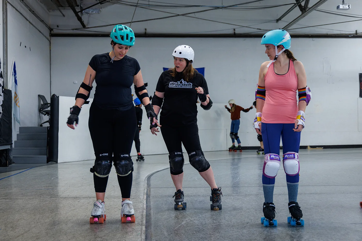 (L–R) Laura Benge, Yve Sojka and Jessica Ward at Wasatch Roller Derby’s weekly crash courses.