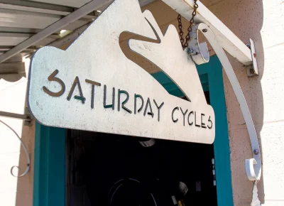 Saturday Cycles store sign.