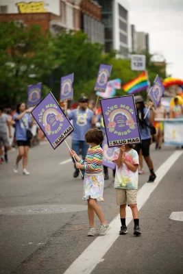 Family members walked with the SLUG float in the 2022 Pride Parade.