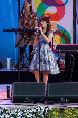 Zooey Deschanel performing during a chilly evening for the Melt Away Tour.