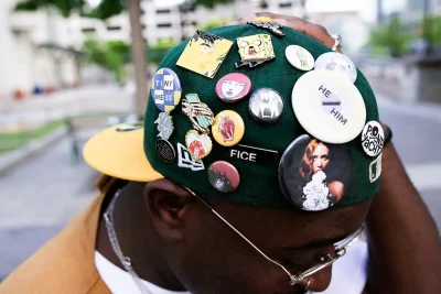 James Ray Davis III wearing a hat with many hat pins.