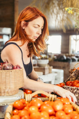 Jen Winter organizes the fresh, seasonal produce at The Kinlands’ market, located in the heart of the property.