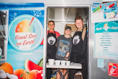 (L-R) Natalie Jackson, Bailey Warnick and Tommy Vickery of Finest Sno on Earth, one of the many food and drink vendors on site. (Photo: @clancycoop)