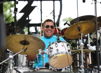 Drummer for Ryan Montbleau loving every second during the set at the Red Butte Garden. (Photo: LmSorenson.net)