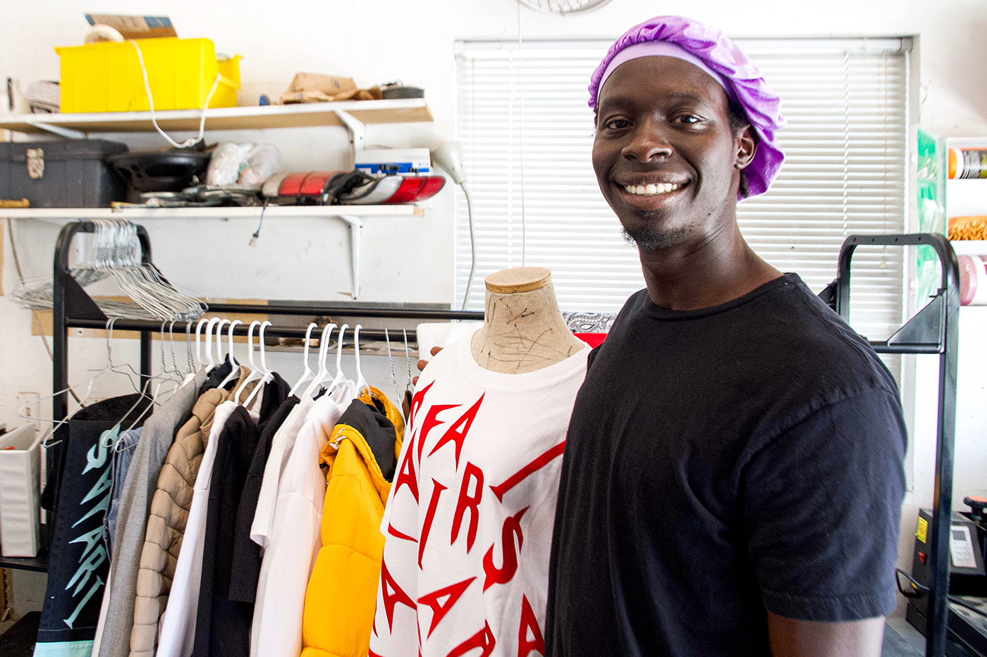 South Sudanese fashion designer and brand owner Jokie Riak makes custom clothing with repurposed and quality fabrics, bringing his manifestations to life.