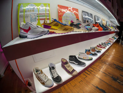 One of FICE Gallery’s shoe walls containing Nike, ASICS, Vans, and more. (Photo: Chay Mosqueda)