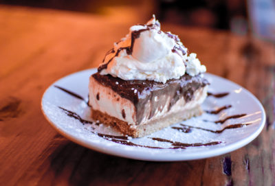 They bring us the 2nd Ward Delight ($7.50), a caramelized graham cracker crust topped with layers of sweet cream cheese, chocolate custard and whipped cream.
