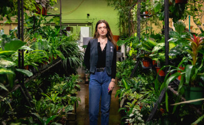 “Plants are the new pets,” says Bailey Mueller, who tends to the foliage at Paradise Palm with thoughtfulness and precision.