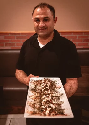 Afghan Kitchen’s Wali Saleem offers beef Mantu, a palette of colorful flavors. 