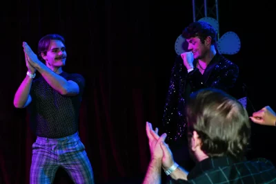Friends gathered for a dance battle amidst the crowd. Photo: Em Behringer