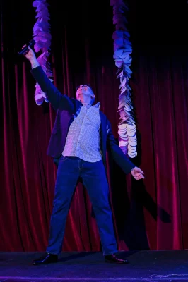 Queer Wonderland MC getting the show started with a song from Prom the musical. Photo: Em Behringer