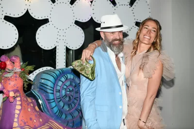 No better time than at Queer Prom to express yourself in front of a snail sculpture. Photo: Em Behringer