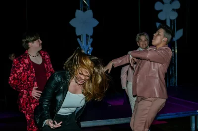 A group of friends very excited about the DJ playing Dolly Parton. Photo: Em Behringer