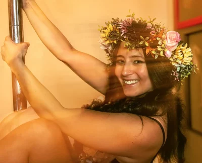Lexa Leigh smiles and wears a flower crown. Photo: Bonneville Jones