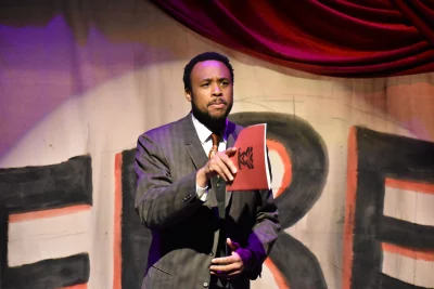 Carleton Bluford points toward the audience as Wallace Henry Thurman in Jenifer Nii's play Fire! at Plan-B Theatre. 