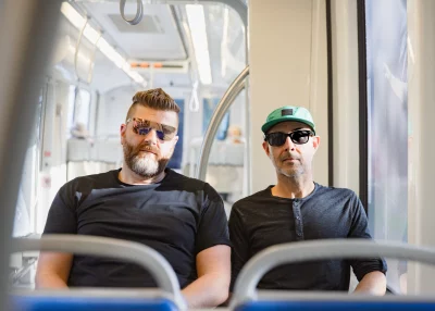 SLC musical duo Cassette Drift riding the UTA trax line.