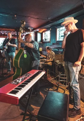 The Howlin' Tomcats perform onstage.