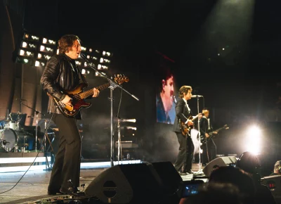 The Arctic Monkeys performing at the Delta Center