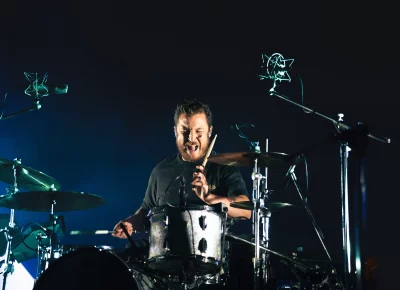 Arctic Monkey's Matt Helders playing the drums during their show at the Delta Center.