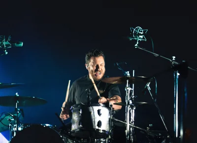 Drummer Matt Helders playing drums for the Arctic Monkeys show at the Delta Center.