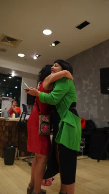 Bianca Velasquez hugging Ruby Chacón.