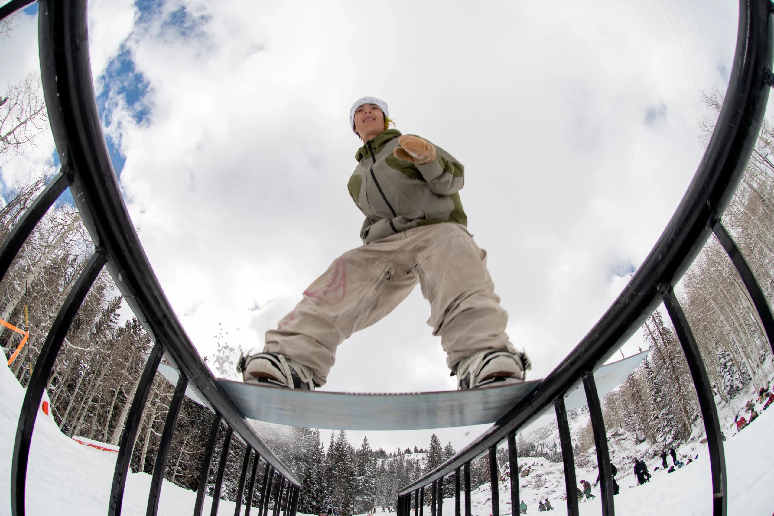 Egan Wint boardsliding a double rail shot from below at Brighton Resort.