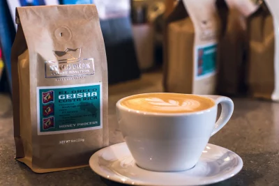 A latte and a bag of coffee at Kings Peak Coffee.