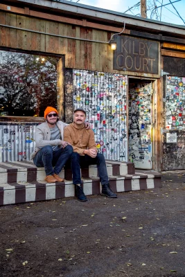 Lance Saunders and Nic Smith sit outside of Kilby Court.