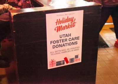 A sign for Utah Foster Care donations.