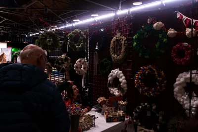 Holiday wreaths hanging on the wall at the Market.