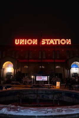 Exterior of Union Station with a Craft Lake City Holiday Market banner on display.