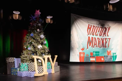 The Holiday Market stage decorated for the season.