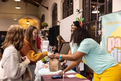 Customers and vendors at Parfé Diem.